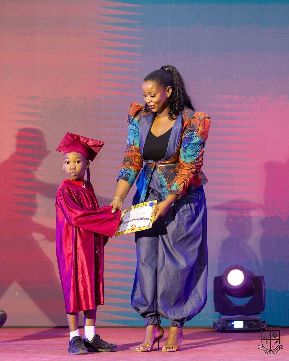 Receiving the certificate on stage