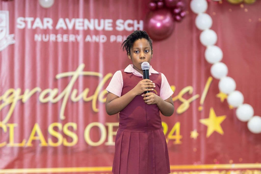 A pupil giving the welcome address